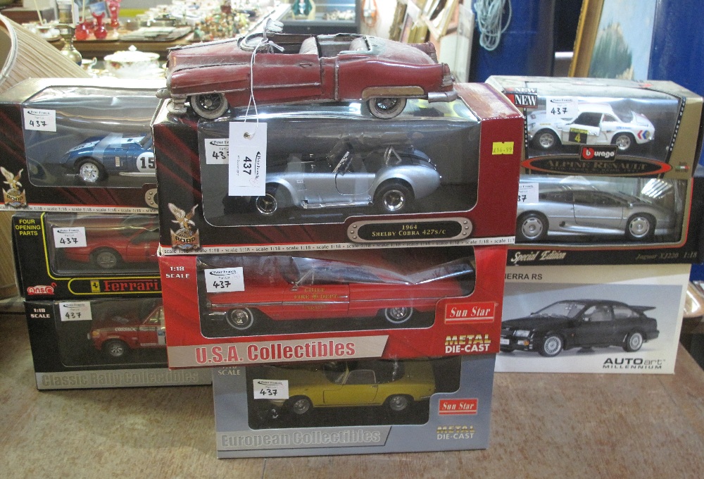 Group of boxed 1:18 and 1:24 scale diecast metal sports cars to include: Cobra Daytona Coupe;