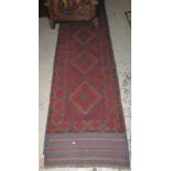 Red ground Middle Eastern Meshwani runner. 59 x 242cm approx. (B.P. 24% incl.