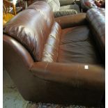 Good quality tan leather two seater sofa. (B.P. 24% incl.