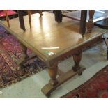 Early 20th Century oak kitchen table with central stretcher support. (B.P. 24% incl.