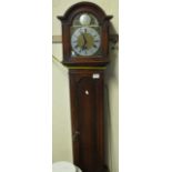 Mid 20th Century oak two train grandmother clock with arched brass face, having silver chapter ring.