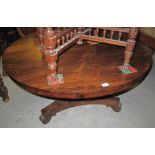 Victorian rosewood circular centre table, on faceted pedestal with trefoil base,