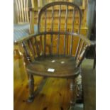 Small ash and elm spindle back child's rocking armchair. (B.P. 24% incl.