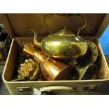 Small suitcase containing assorted metalware including: brass candlesticks; toasting fork;