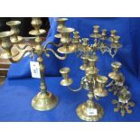 Group of three similar style brass four branch table candelabra together with a pair of brass