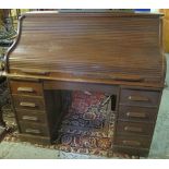 Early 20th Century oak tambour front pedestal kneehole desk. (B.P. 24% incl.