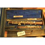 Cased rosewood and nickel mounted oboe marked: Jerome Thibouville Lamy, made in Paris,