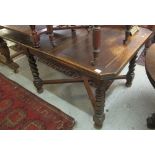 Early 20th Century oak drawer leaf kitchen table on barley twist legs and 'X' stretcher supports.