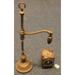 A brass pedestal electric reading lamp with loaded base, requiring rewiring,