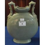 Celadon glaze twin handled moon flask made in Chinese style, probably European. (B.P. 24% incl.