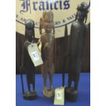 Three similar 20th Century tribal carved hardwood figures of warriors. (3) (B.P. 24% incl.