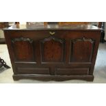 18TH CENTURY WELSH OAK COFFER having moulded edge top, now with metal hinges,