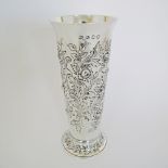 A sterling silver vase repousse and engraved with roses and scrolls Hallmarked by Thomas Whipham,