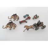 A collection of iron toys, the horse cart L36cm. (7)
