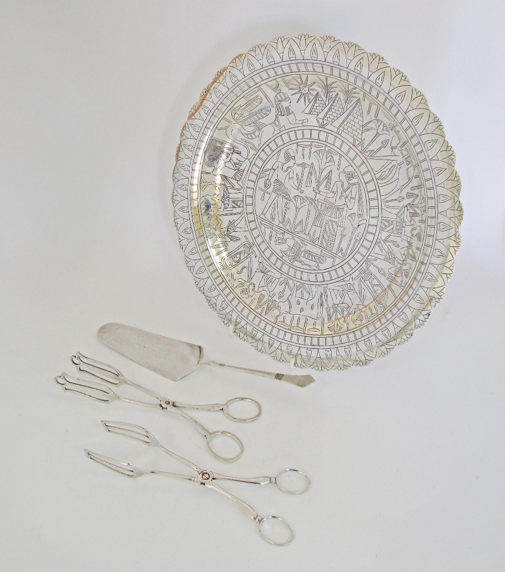 An Egyptian hallmarked silver salver W32cm, weight: 708g, together with a silver cake server and two