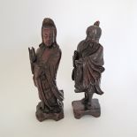 A pair of Chinese wood carvings H25cm. (2)