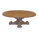 A fine elm Asian / Oriental style oval carved wood center / library table. Mid 20th century. W180cm,