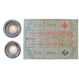 A vintage Roulette table cover 87X120cm, together with two roulette wheels, W39cm and W36cm (3).