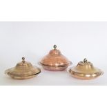 A collection of Turkish copper & brass dishes & covers, the largest W25cm. (6)