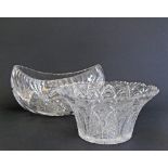Two Bohemian finely cut crystal center pieces. A boat shaped vase W28cm, and a round trumpet