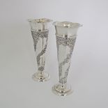 A pair of sterling silver vases H16cm hallmarked London 1901. (2)