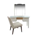 An early 20th century white painted pine kidney shaped dressing table W122cm, D45cm, H158cm, with