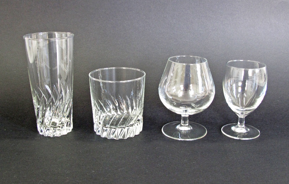 A collection of Luminarc glasses comprising 13 tall, 12 short, 4 brandy and 6 small wine glasses. - Image 2 of 3