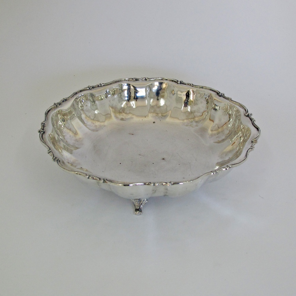 A silver shallow bowl marked 900, c19th century. Weight: 290g, W22cm, H5.5cm. - Image 2 of 8