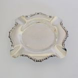 A Sterling silver ashtray on four ball feet hallmarked Mappin & Webb, Birmingham 1911. Weight: 104g,