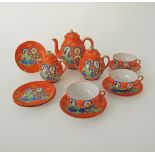 A part Japanese vintage eggshell white porcelain, handpainted orange ground tea service,