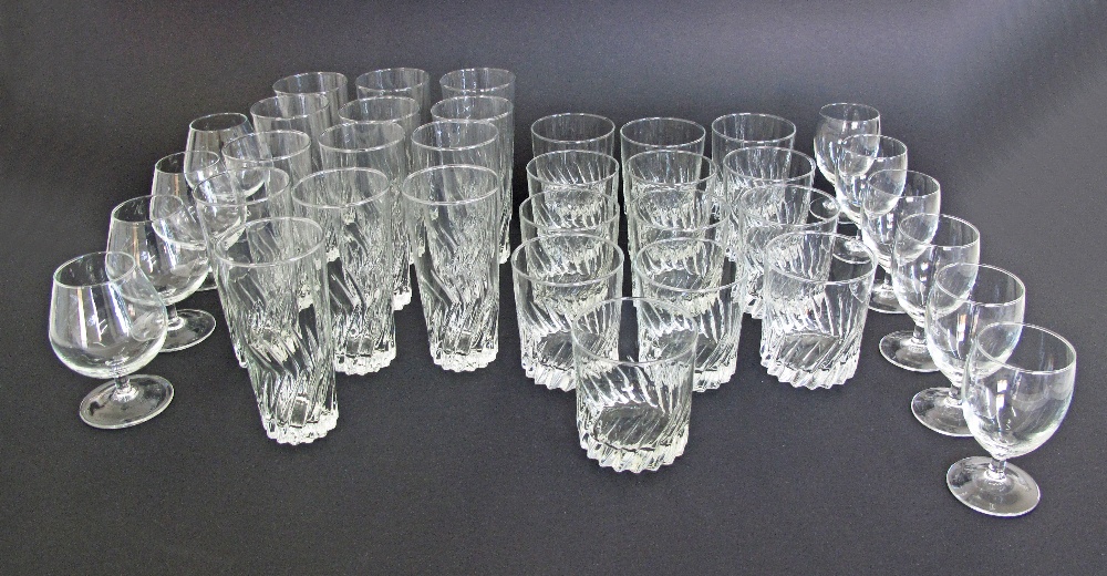 A collection of Luminarc glasses comprising 13 tall, 12 short, 4 brandy and 6 small wine glasses.
