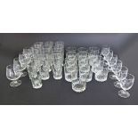 A collection of Luminarc glasses comprising 13 tall, 12 short, 4 brandy and 6 small wine glasses.