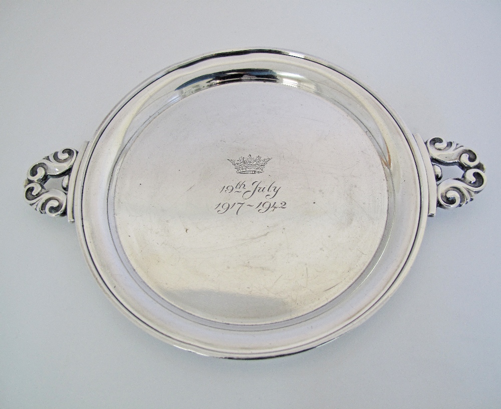 A Danish Georg Jensen Hallmarked sterling silver dish with handles, an engraved crown and an