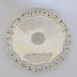 A sterling silver salver engraved with a crest with two lions by Walker & Hall, Hallmarked Sheffield