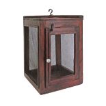 An early 20th century small food cupboard with wire net all around and a hanging hook. 34X34cm,