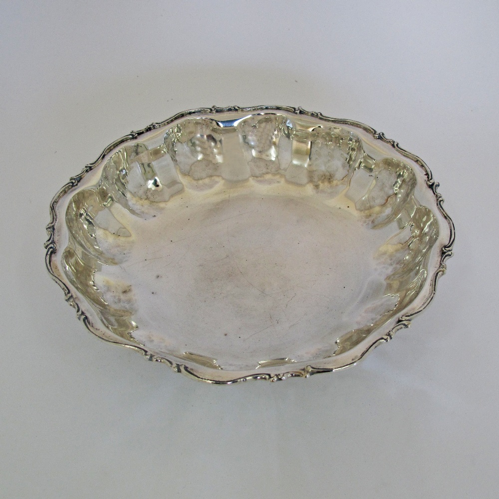 A silver shallow bowl marked 900, c19th century. Weight: 290g, W22cm, H5.5cm. - Image 3 of 8