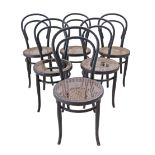 Six vintage black bentwood chairs early 20th century, with rattan seats in need of restoration.