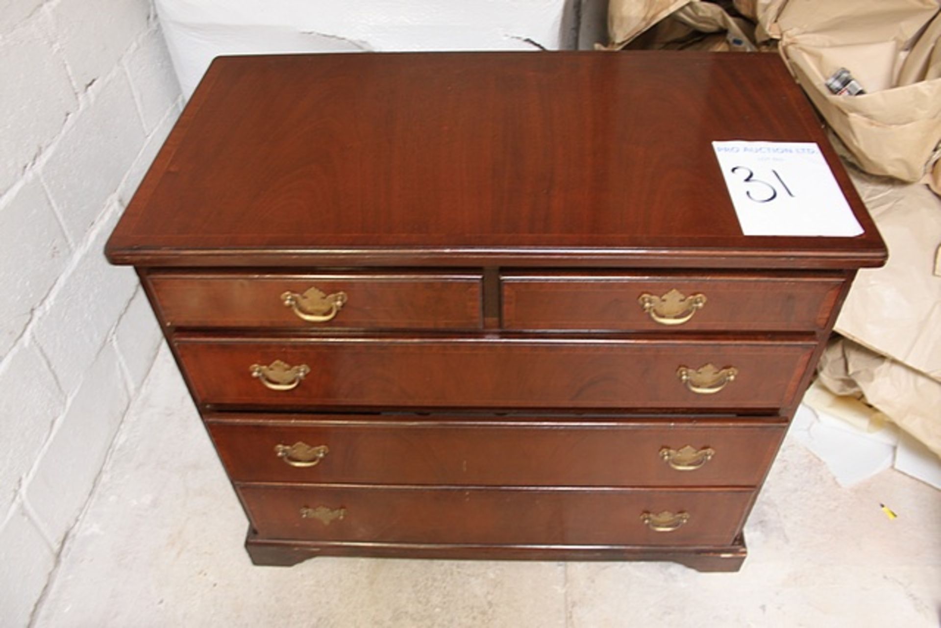 Mahogany side board two half drawers, pull down drawer and two full drawers on plinth base 1010mm