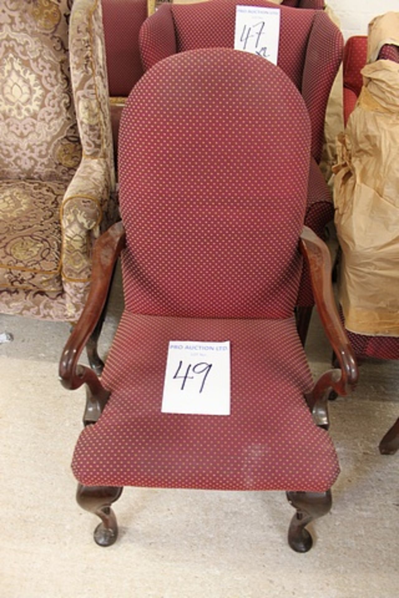 A pair of mahogany framed Windsor style arm chair cabriole legs with shaped and carved wooden arms