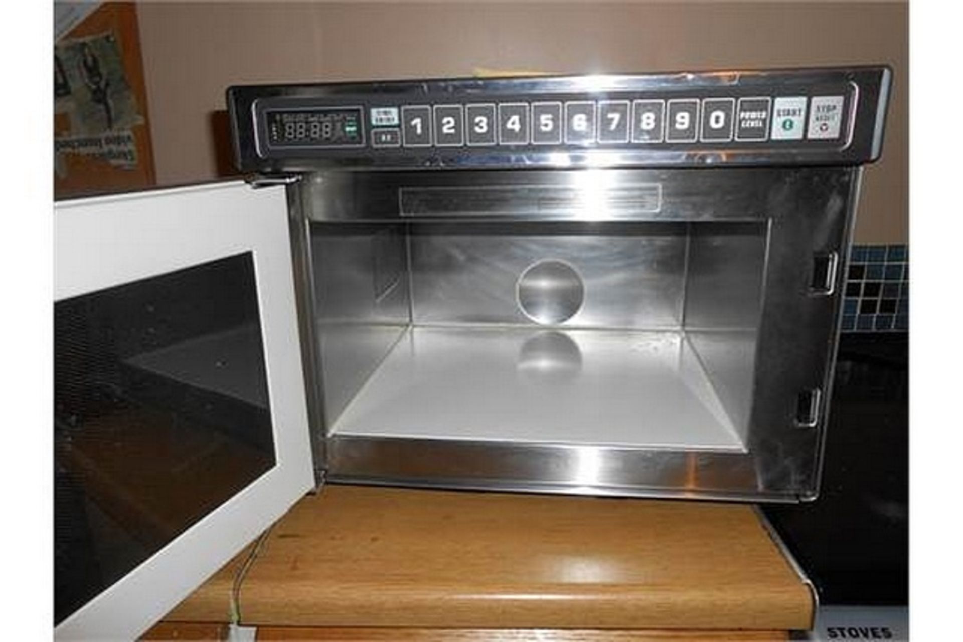 Amana UHDC511 1100 Watt stainless steel heavy duty compact microwave 11 power levels 100 program