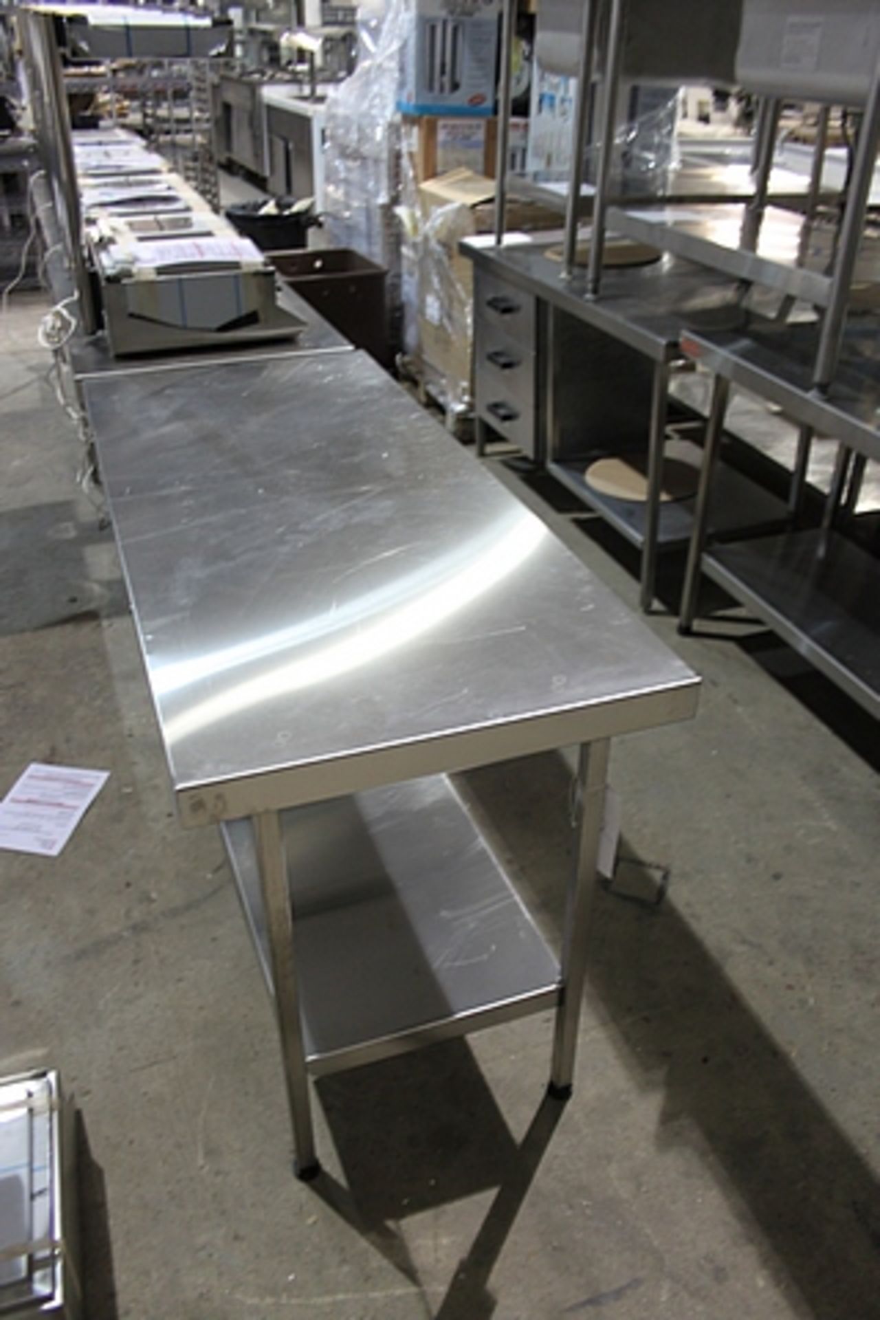 Stainless steel centre table with undershelf 1500mm x 650mm