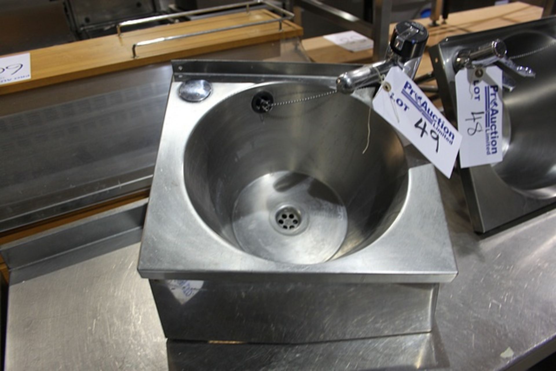 Stainless steel wall mounted hand wash basin
