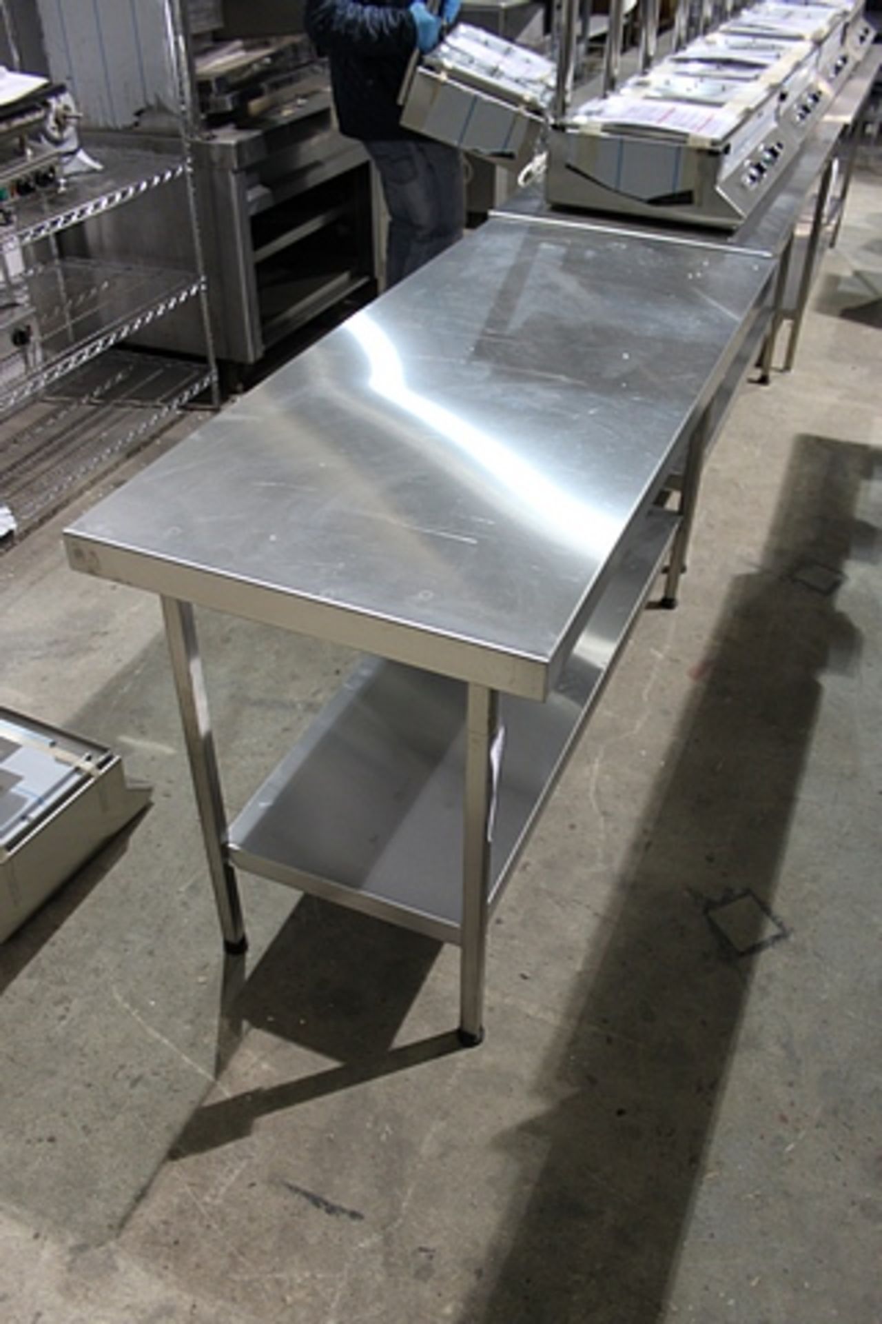 Stainless steel centre table with undershelf 1500mm x 650mm