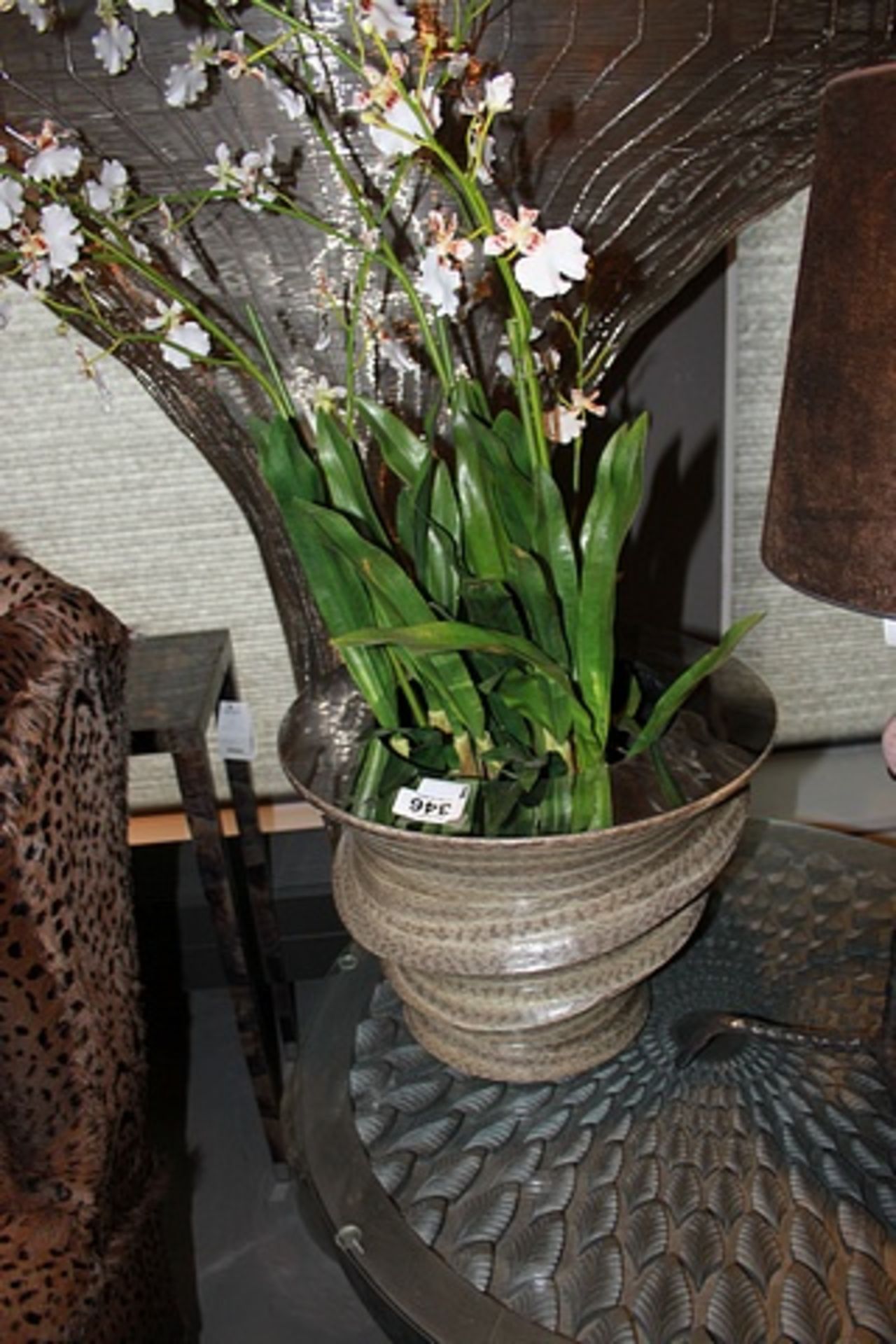 Vase add an exotic flair to your interior with this unique stainless steel and snakeskin vase