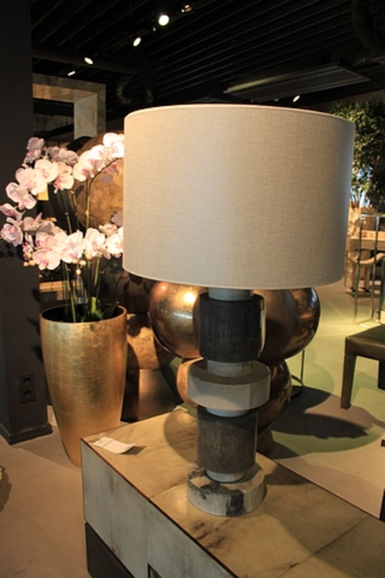 Table Lamp flaunts a distinctive modern design with water grey, caviar Stingray and dark grey