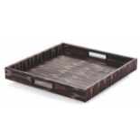 Tray Tribe flaunts rectangular dimensions and a striking all over ethnic inspired red and brown