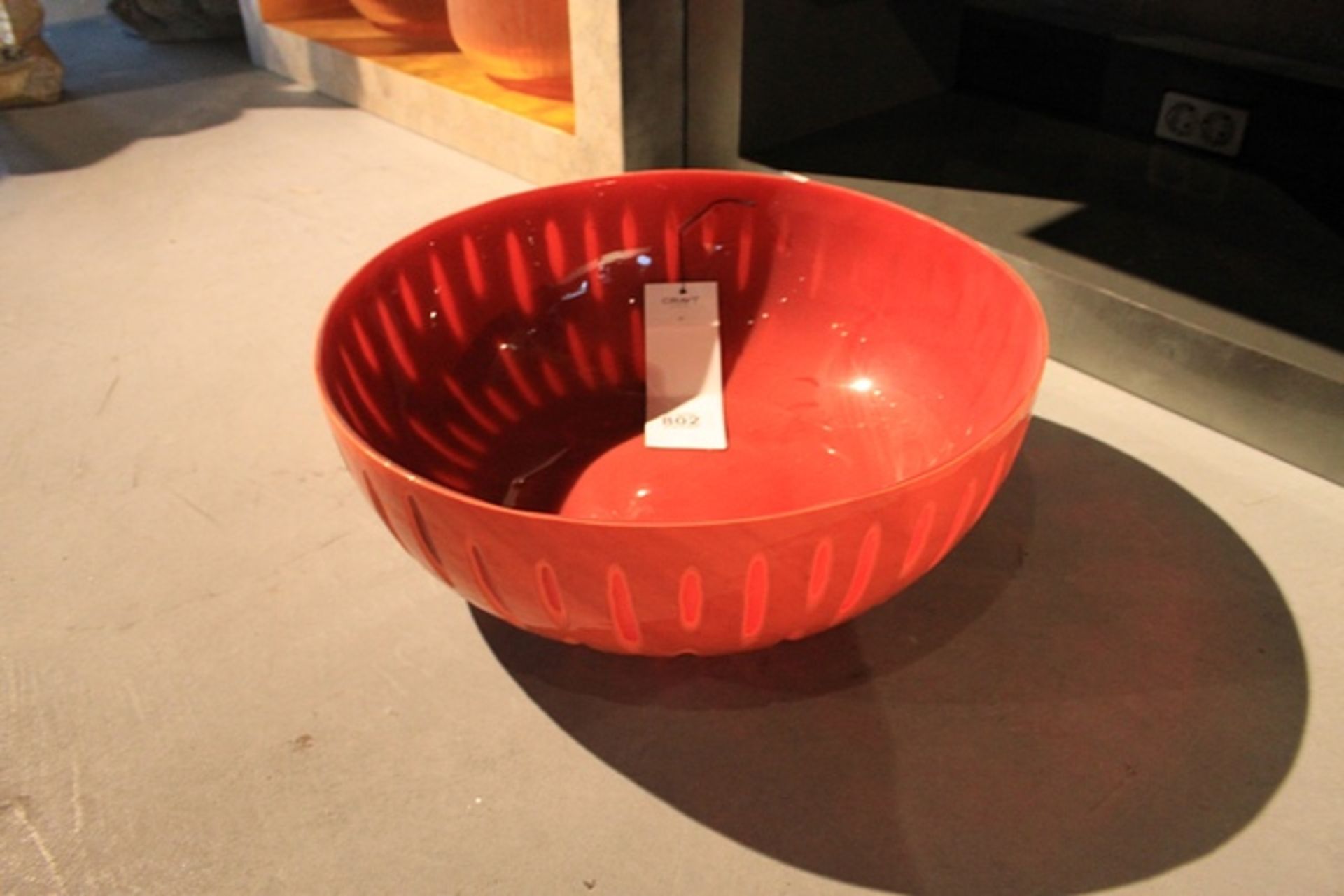 Bowl Orange classic two-tone vintage circular bowl featuring a wraparound cut out design and