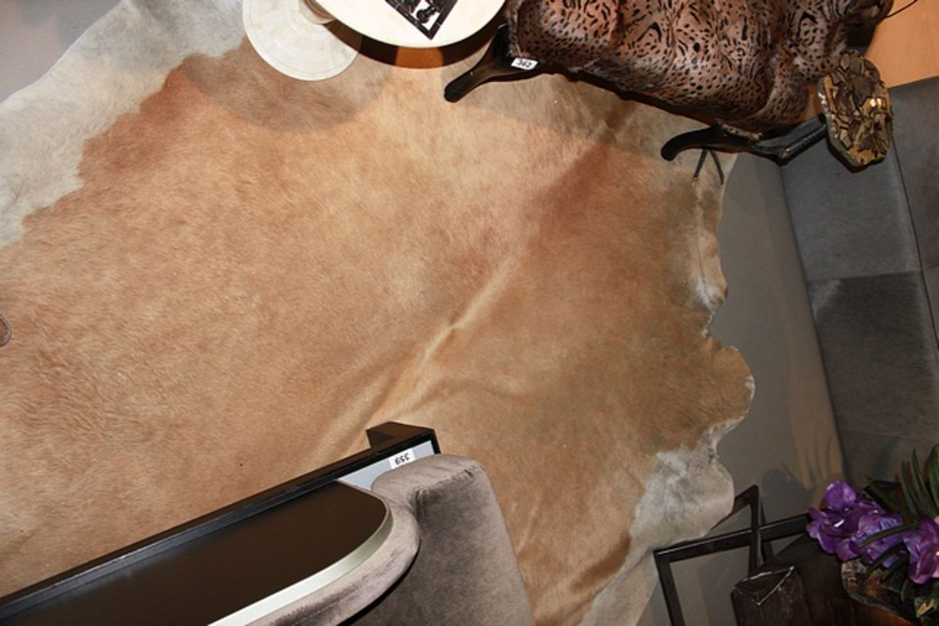 Cow Hide natural skin rug in beige and white copper skin these light cowhide rugs have a cool and