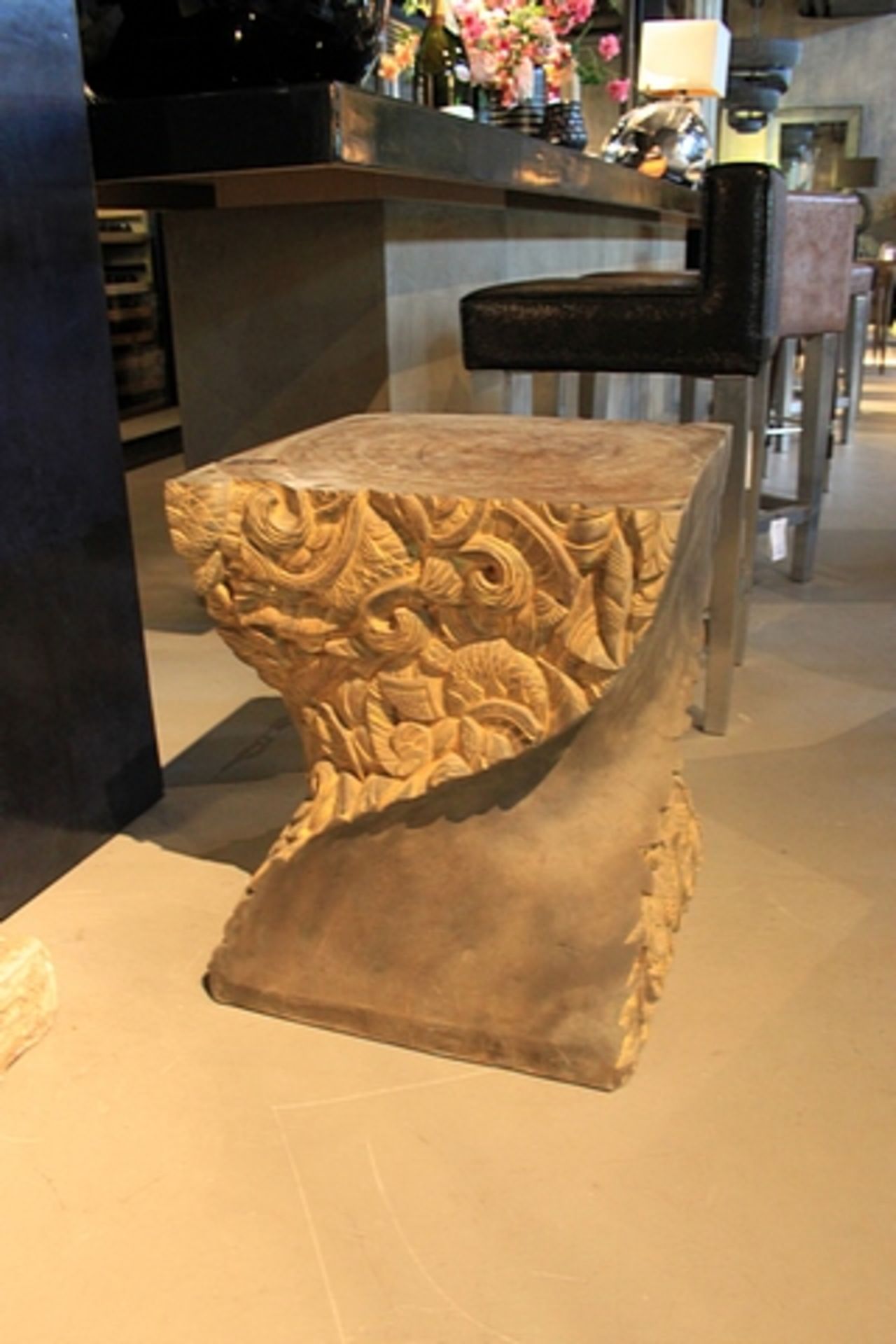 Side table hand carved soar wood with a charcoal finish soarwood possesses a magical buoyancy and