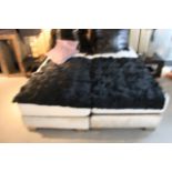 Throw PONERE black leather soft textured throw for luxurious lounging. Can also be used for dressing